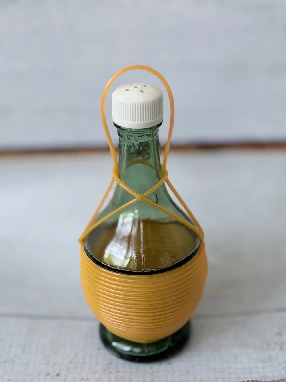 Vintage Ucagco Italy Green Glass Wine Bottle Salt Shaker Plastic Raffia Wrap